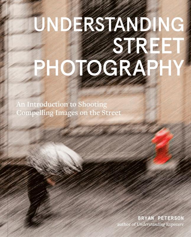 blurry photograph background of a person with an umbrella in the rain