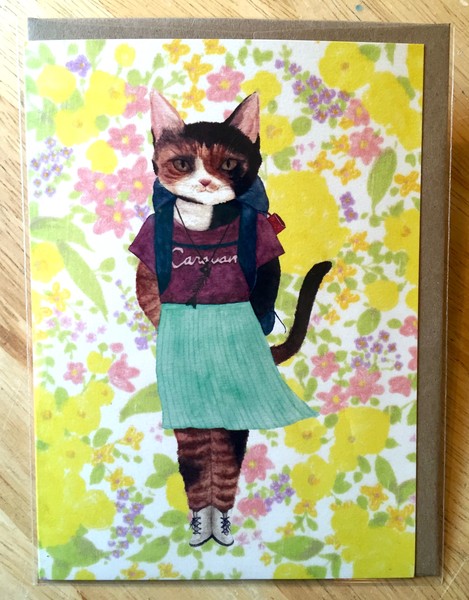 Furcoats and Backpacks greeting card (Vivian—pleated skirt and white boots)