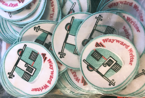 a bunch of cute patches with a teal travel trailer and the words "wayward writer"