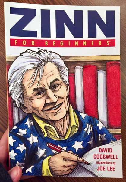book cover with Howard Zinn writing in a book in front of a red and white bookshelf